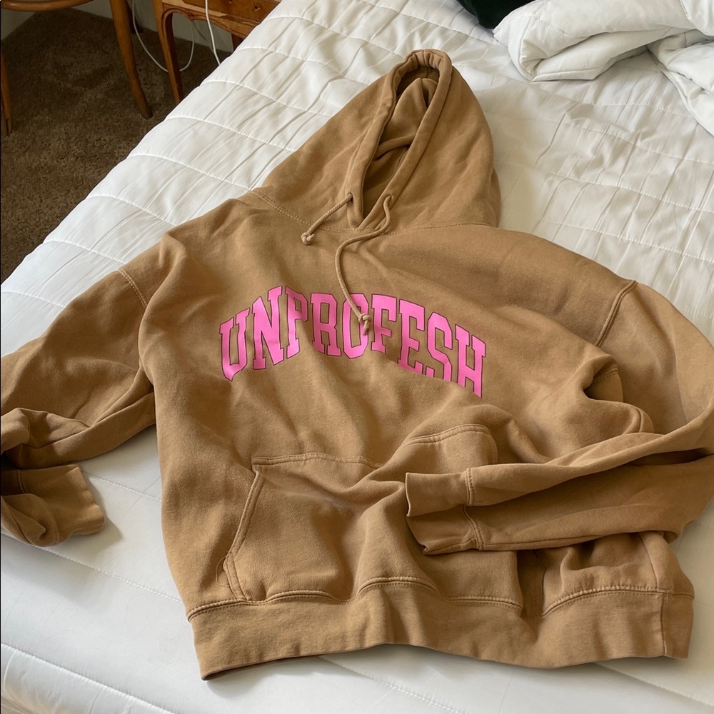 Stylish Tan Hoodie with Pink Lettering